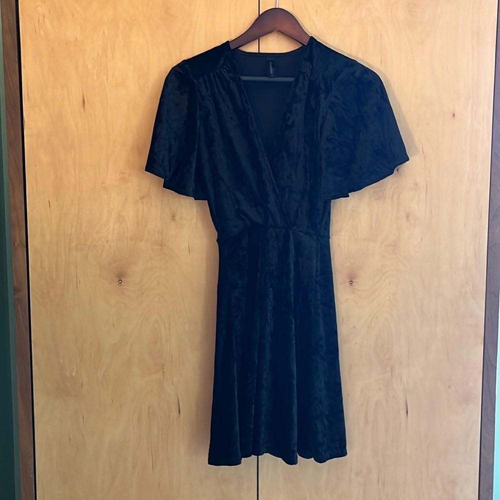 Black velvet above the knee dress.